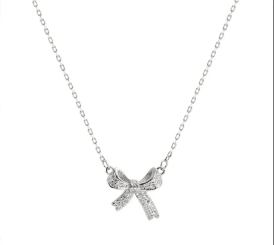 Exquisite Copper Inlaid Zirconia Bow Pendant